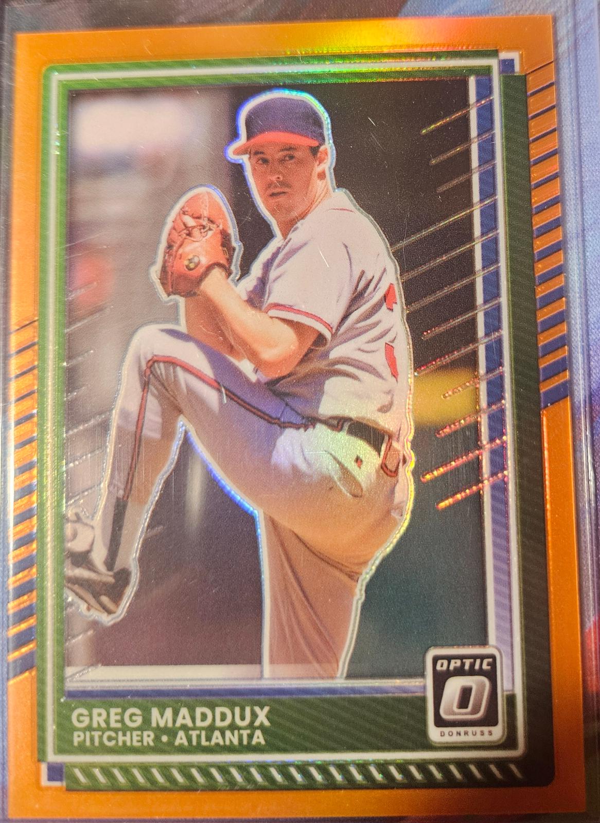 Greg Maddux [Orange Optic] #9