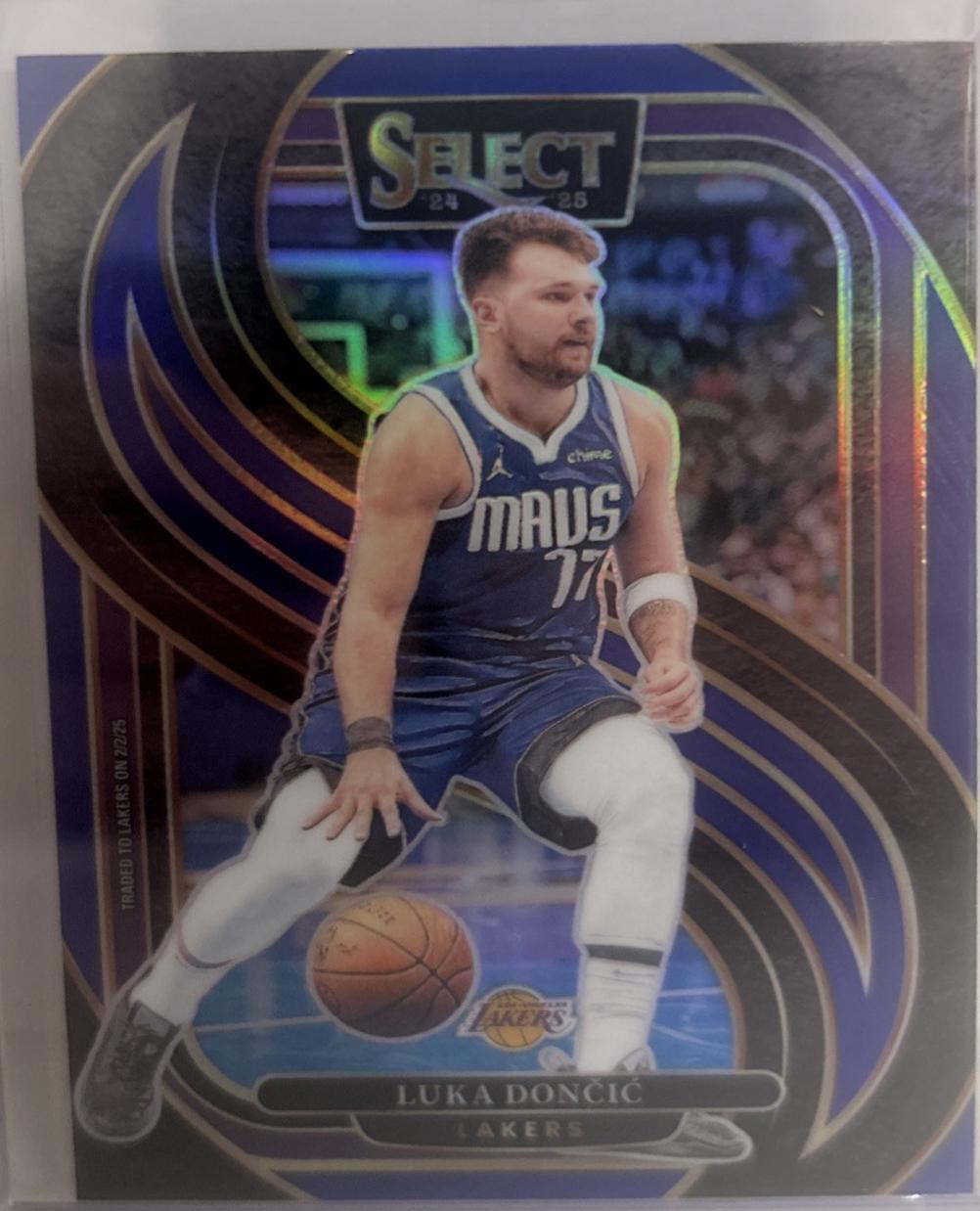 Luka Doncic [Light Blue Prizm] #141