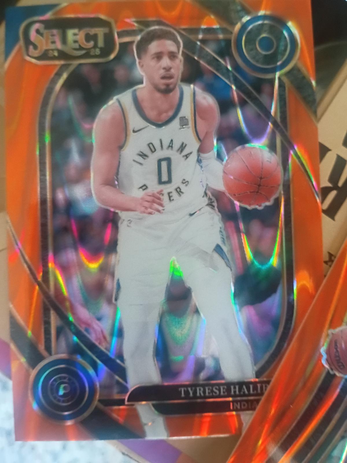 Tyrese Haliburton [Orange Tectonic Prizm] #220