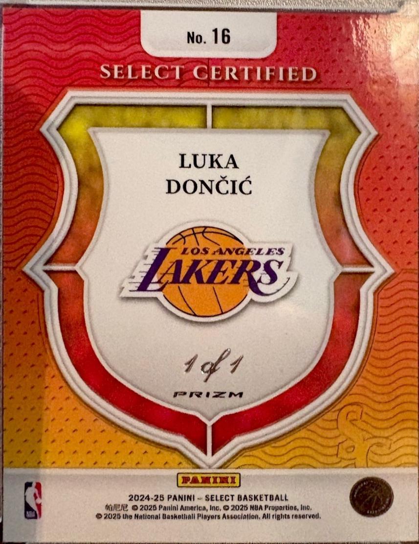 Luka Doncic [Black Finite Prizm] #16