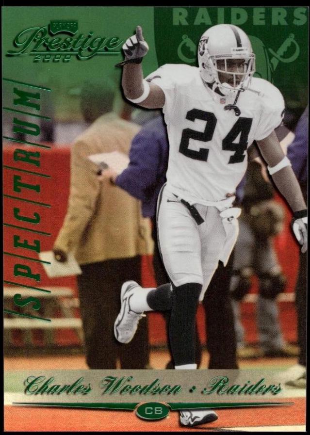 Charles Woodson [Spectrum Green] #140