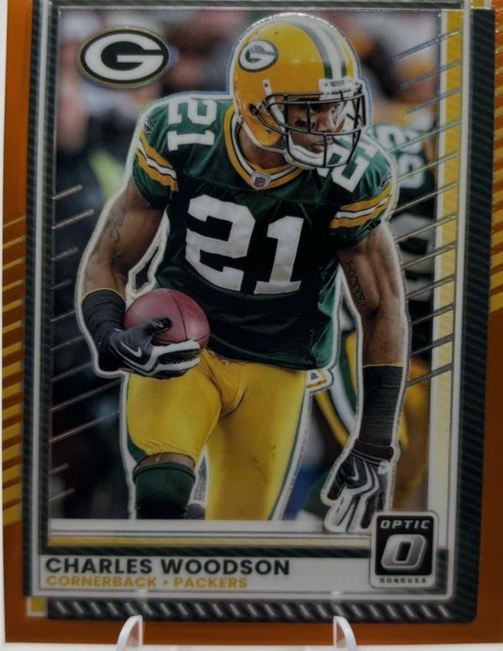 Charles Woodson [Orange] #103