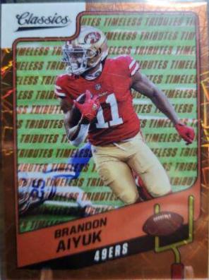 Brandon Aiyuk [Premium Edition Timeless Tributes Orange] #82
