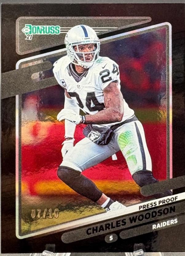 Charles Woodson [Press Proof Black] #91