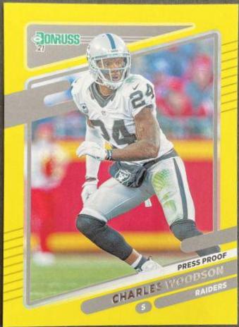 Charles Woodson [Press Proof Yellow] #91