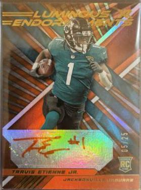Travis Etienne Jr. [Orange] #121
