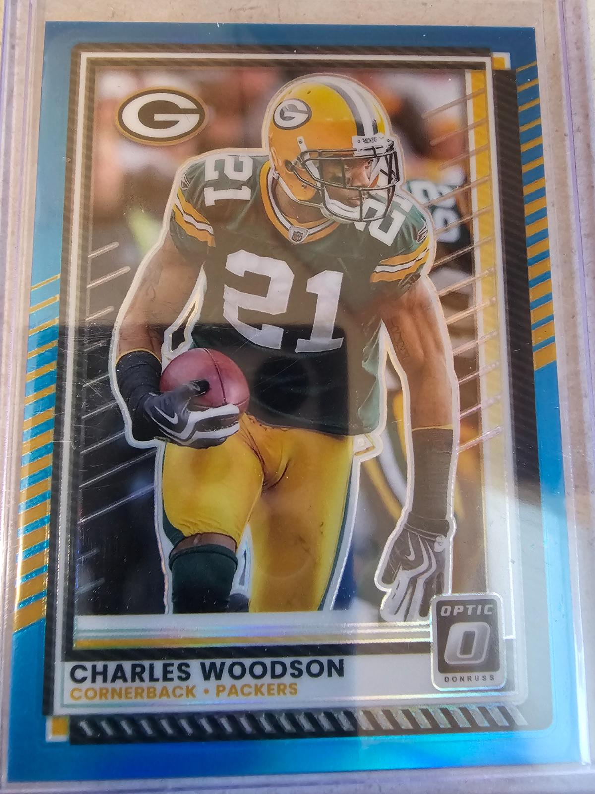 Charles Woodson [Neon Blue] #103