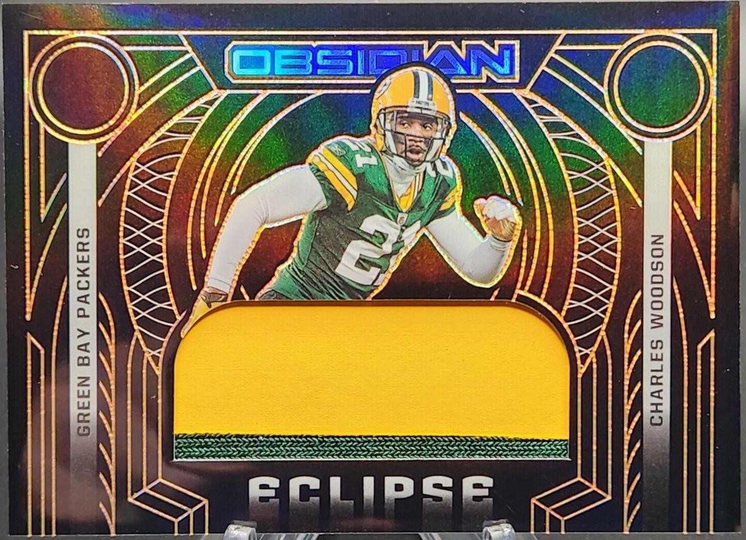 Charles Woodson [Orange] #ECL-CWO