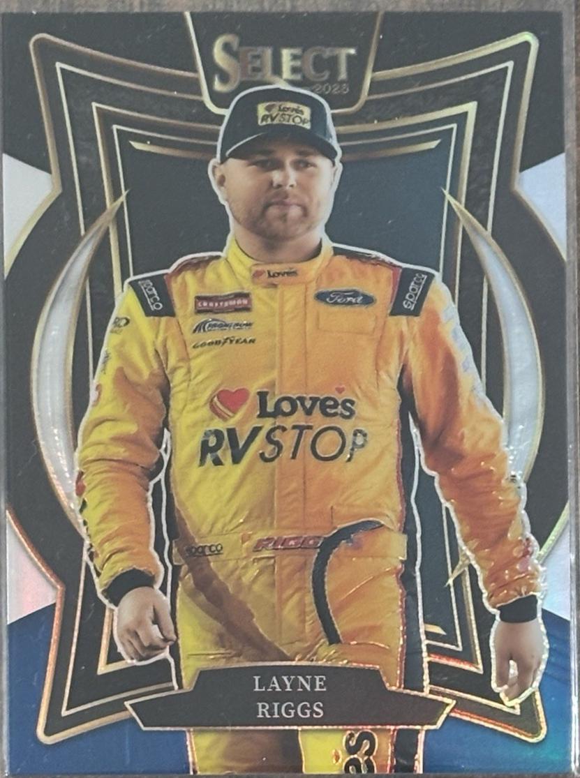 Layne Riggs [Black Blue Prizm] #9
