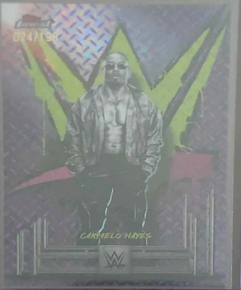 Carmelo Hayes [Purple Checkerboard Refractor] #56