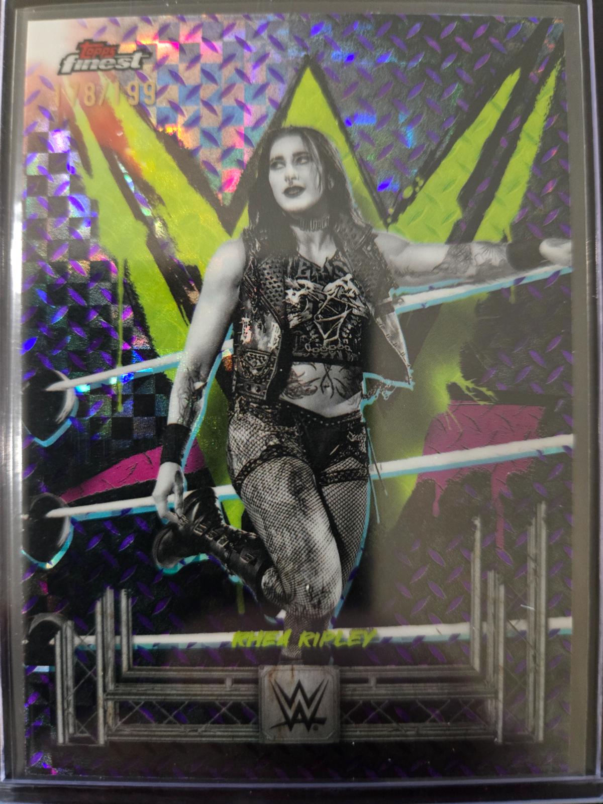 Rhea Ripley [Purple Checkerboard Refractor] #60